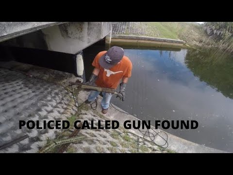 Police called magnet fishing.  Gun found.