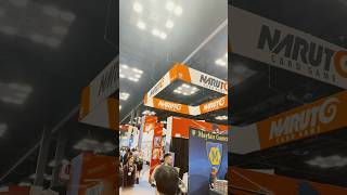 Naruto Card Game Booth by Bandai at Gen Con 2026. Get your cool backpacks and go away!