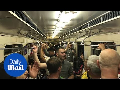 England fans chant on the Moscow metro on their way to the game