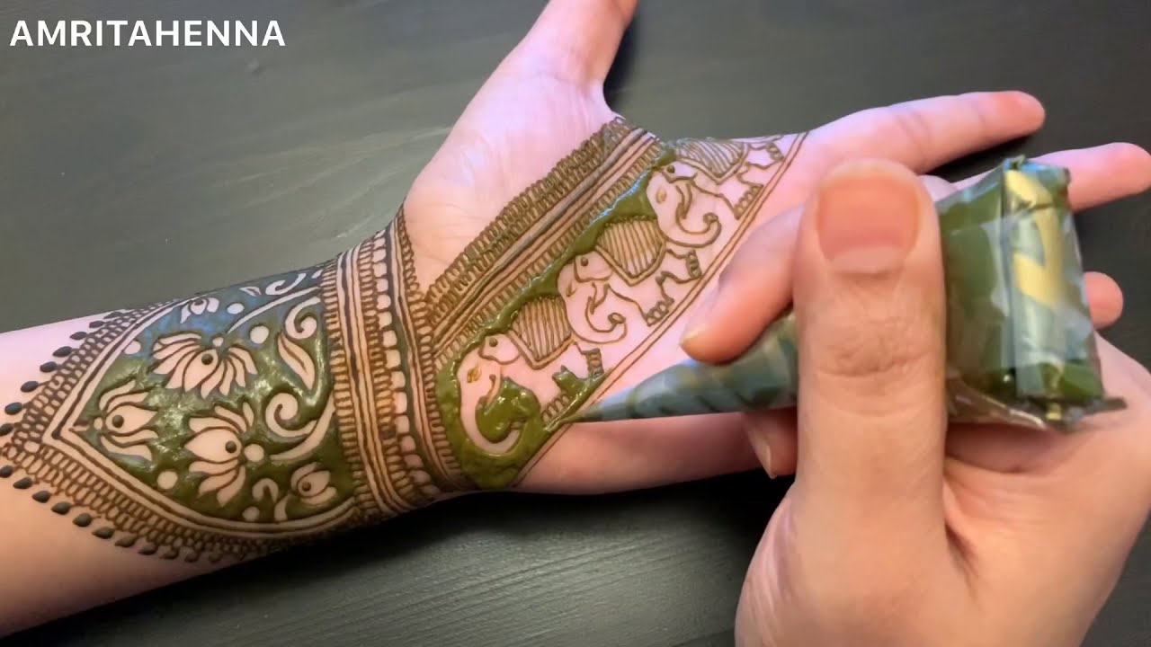 traditional rajasthani mehndi design elephants for bride by amrita henna