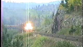 preview picture of video 'Algoma Central SD40, GP38's, & 3 GP7's get a run for the hill out of Hawk Jct'