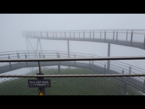 First Cliff Walk by Tissot - In thick fog