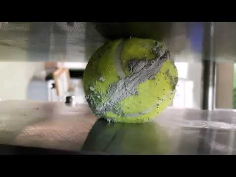 Shear tests of tennis balls filled with mortar. The compressive load is 3kN.