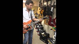 Nashville musician Josh Waters from Lewis Brice Band tries out a Reverend Warhawk RT guitar.