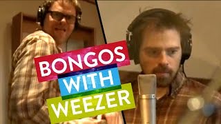 Rivers Cuomo of Weezer jams with Rainn Wilson (Bongos!)