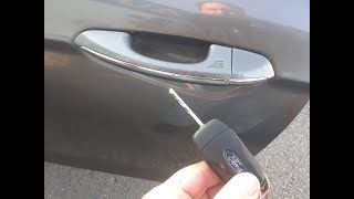 How to Unlock a Ford Fusion Using Hidden Key Cylinder With Dead Battery