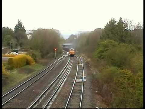56312 thrashes through Cheltenham on 6Z34 Chaddesden Sidings - Cardiff Tidal in the rain
