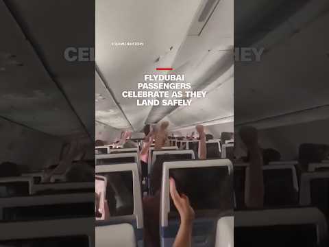 Flydubai passengers celebrate as they land safely