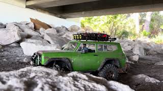 International scout crawling massive rock garden. Stop motion winch rescue.