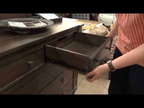 Part of a video titled How to Remove a Drawer with Metal Glides - YouTube