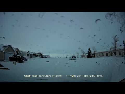 Blizzard 3/14/2021 day after.  Cheyenne Wy.   The dig out!