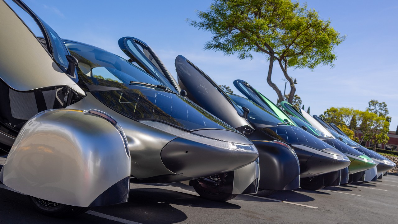 Aptera three-wheeled solar electric vehicle on the Carlsbad assembly line validation floor