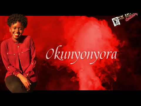 Michelle Kyalisiima - Papa lyrics Video(SKMUSIXGALLARY +256706716057).