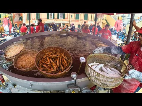 O maior festival de comida de rua de peixe frito do mundo. Camogli, Itália