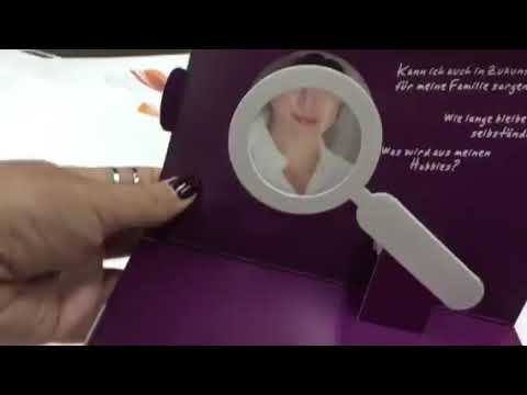 Coffret marketing Sanofi avec loupe en papier pivotant sur un visage et tiroir d'information