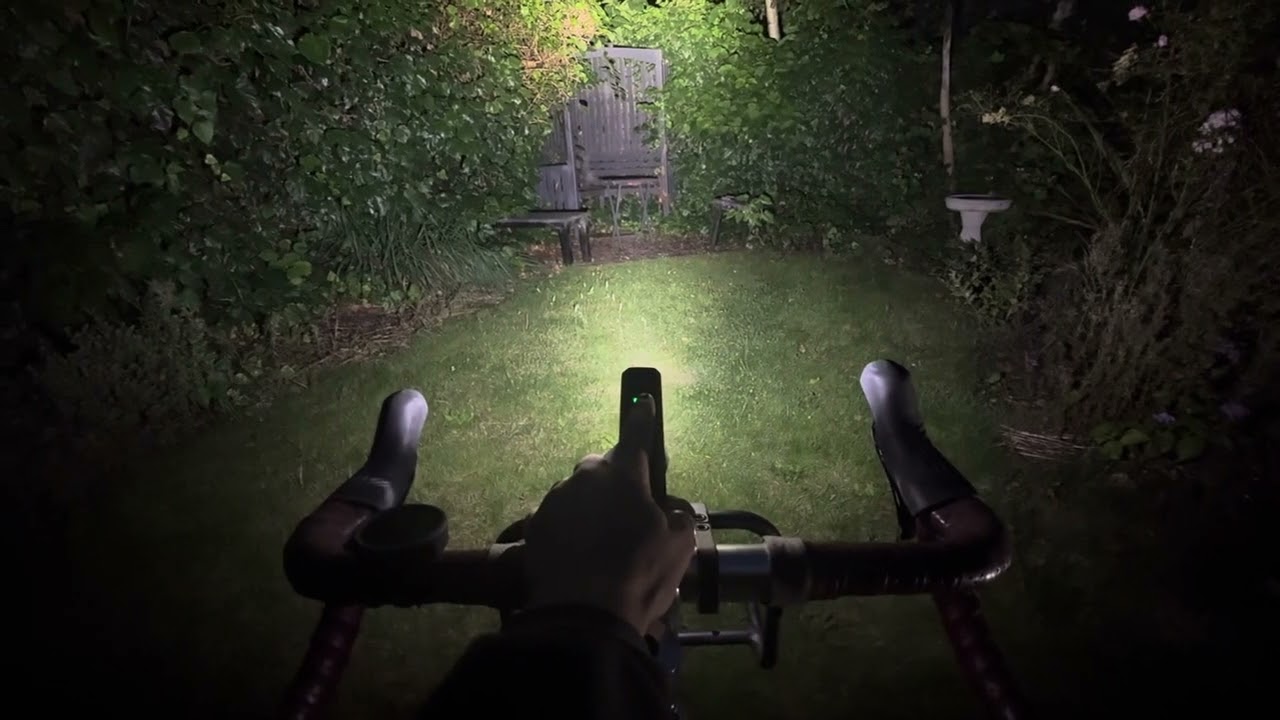 Magic Shine ALLTY 1200 bike light cycling through the modes - 300, 600, 1200 lumens - YouTube