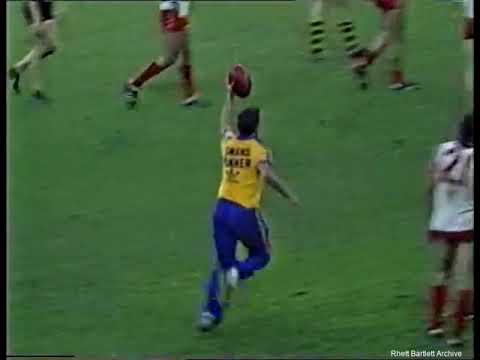 1986 Football ends up in construction site. Sydney Runner Craig Davis. VFL.