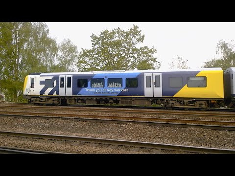 SWR's 450067 in "Thank you all keyworkers" livery, at West Byfleet on 28/04/22