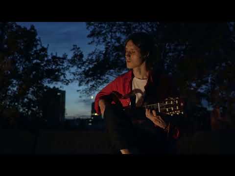 Guitar street performance at Landscape Alley, Kyiv, Ukraine, Aug. 8, 2024