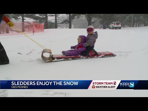 Iowa sledders enjoy in the snow