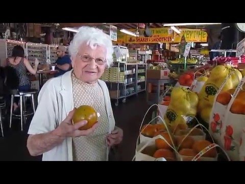 Mommy buys fruit at New River Groves Davie, Florida