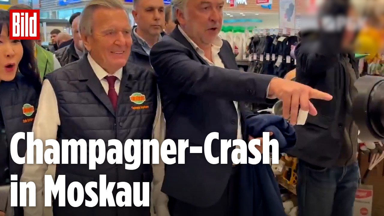 Schröder zu Besuch in Moskau: Kurioser Unfall – Kameramann kracht in Champagner-Auslage