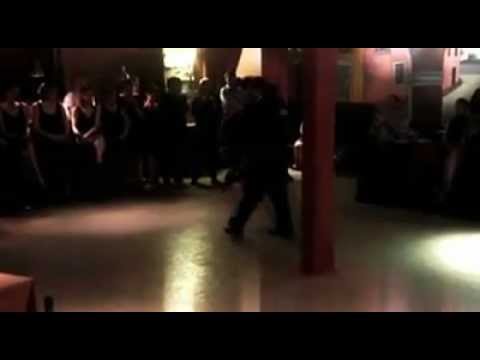  Adrian Costa  and  Amanda Costa  are  dancing  to  the  tango  "  No MIentas  "