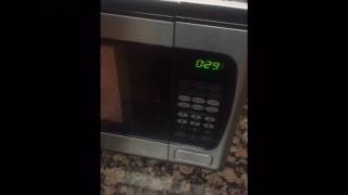 Easy fix microwave from spinning when opening door