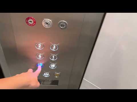 Modded Otis Square Lexan Traction lifts at 33 Park Road, Milton, QLD