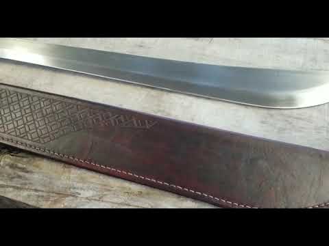 Machete and handmade leather sheath