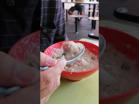 Eating pork porridge at clementi hawker centre