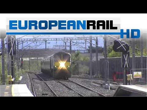 Iarnród Éireann Irish Rail 201 loco 228 + Enterprise De Dietrich set 9001 passes Clongriffin Station