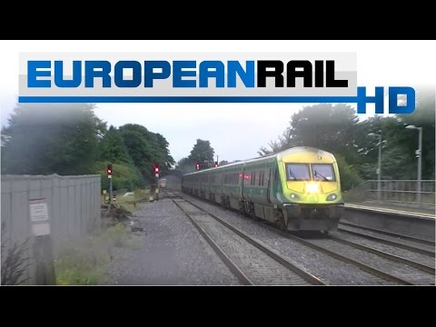 Irish Rail 201 loco 209 + mk4 set passes Kildare