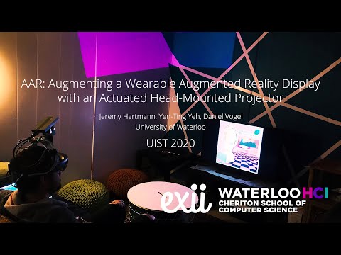Thumbnail for 'AAR: Augmenting a Wearable Augmented Reality Display with an Actuated Head-Mounted Projector'
