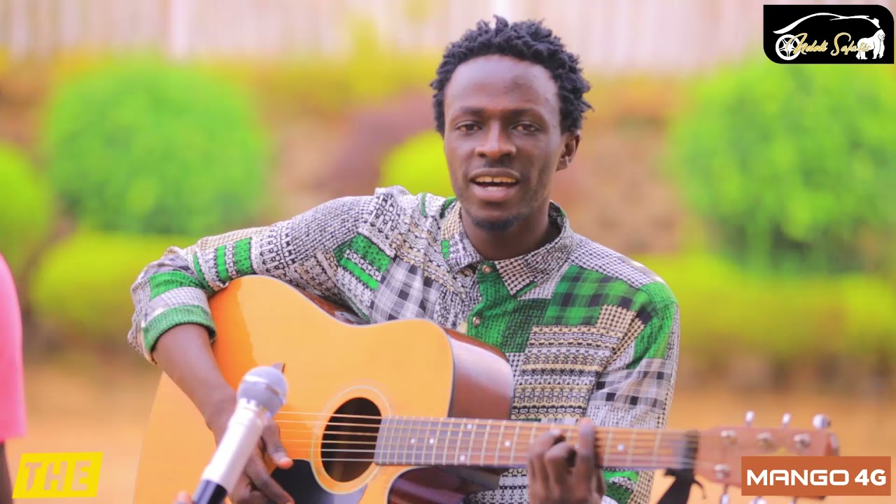 Wa muhungu wanyoye umuziki na Guitar yongeye guhura na M Irene  barahatwitse koko  mbega ubuhanga