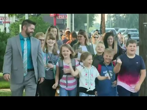 Firefighters walk kids to school in Royal Oak