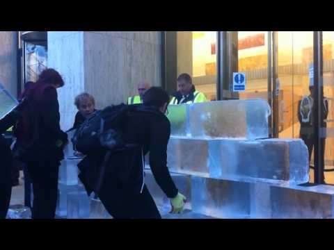 Climate protesters build ice pyramid at Shell HQ