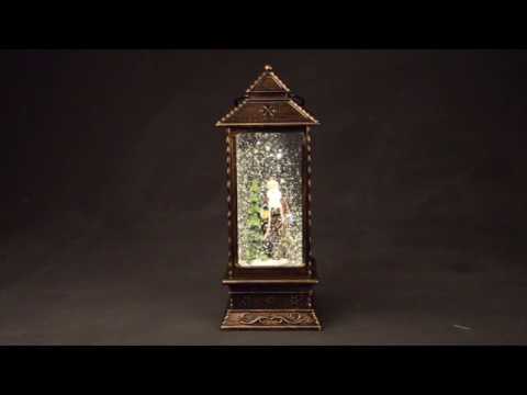 Santa snowstorm scene in a lantern