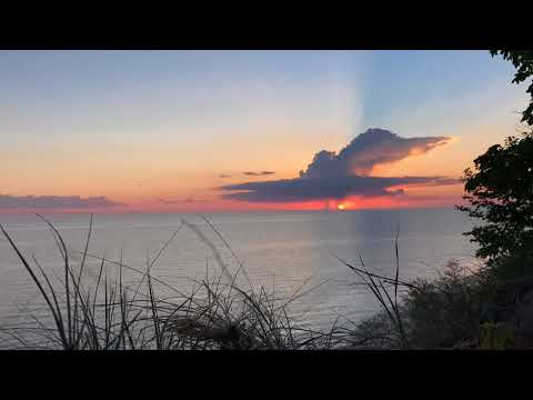 Epic thunderstorm on Lake Michigan during the sunset from PJ Hoffmaster State Park