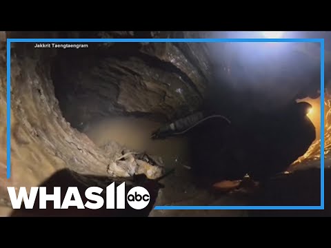 2 miners still trapped inside flooded Laos cave