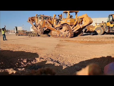 cat bulldozer d8r low power and engine problem, loading to volvo truck 440 and help each other .