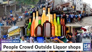 People Crowd Outside Liquor shops