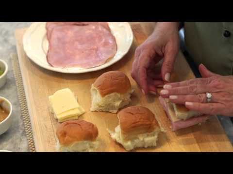 Ham & Swiss Cheese Sandwiches Baked in the Oven With Butter Sauce : Making Delicious Meals Video