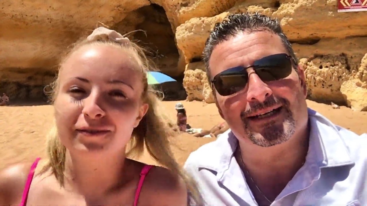 Join travelers on a visit to Praia da Coelha beach.