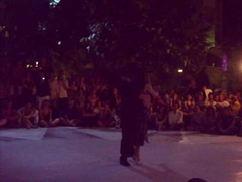  Adrian Veredice  and  Alejandra Hobert  are  dancing  to  the  tango  "  Una Emocion  "  at  Sitges International Tango Festival  in  2010
