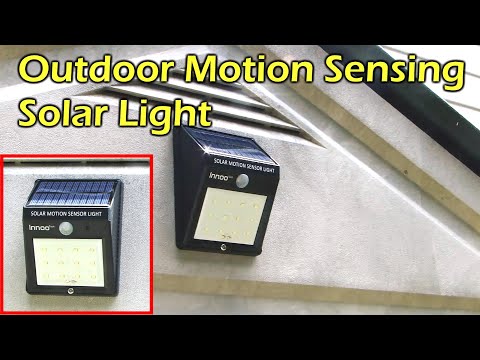 Solar powered motion sensing 12 led waterproof light