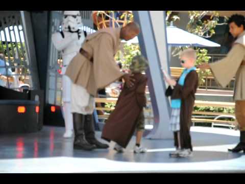 Brandon Fighting Off Storm Troopers in Disneyland 6.19.2010