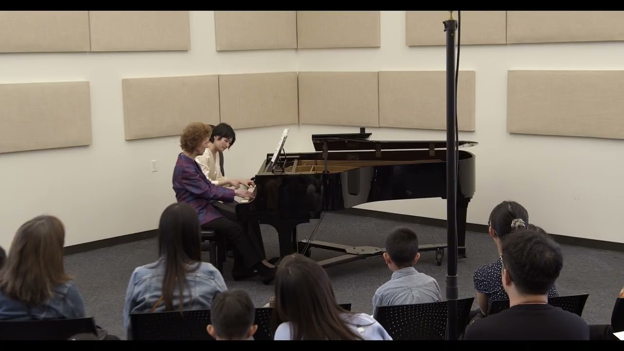 Dr.Robin McCabe and Cicy Li performing Debussy's Petite Suite