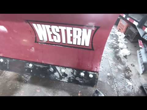 Installing new cutting edge and back drag blade.