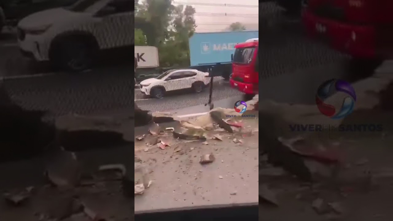 Caminhão bate em mureta e fica atravessado na serrinha sentido Guarujá